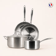 Set de 4 pièces Triply Menastyl en acier inoxydable : 2 poêles, 1 casserole et 1 faitout avec couvercle, fabrication française