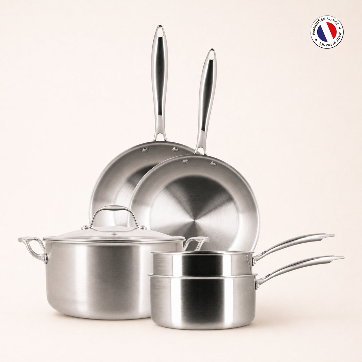 Set de 5 pièces Triply Menastyl en acier inoxydable : deux poêles, deux casseroles et un faitout avec couvercle, fabrication française