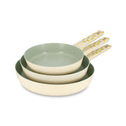 Lot de 3 poêles aluminium Citron Menastyl empilées, intérieur vert sauge, manches motif citrons jaunes
