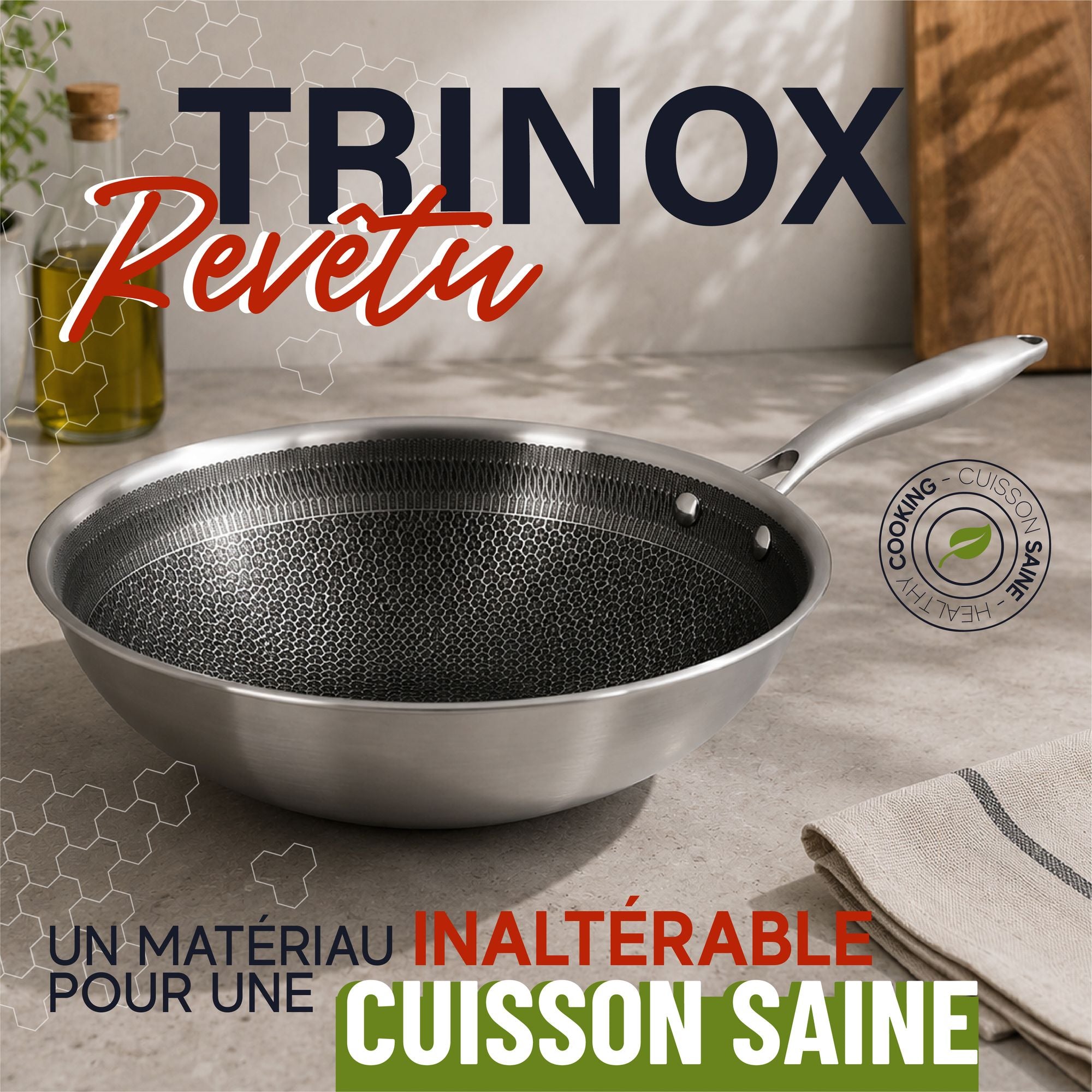Wok Trinox 28cm en inox avec revêtement antiadhésif alvéolé noir, détail intérieur texturé et poignée acier