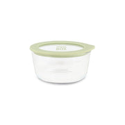 Boîte hermétique ronde Pressbox 470ml Menastyl en verre transparent avec couvercle vert pastel, vue de face