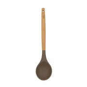 Cuillère Eliott Menastyl en silicone marron avec manche en bois naturel, vue complète sur fond blanc