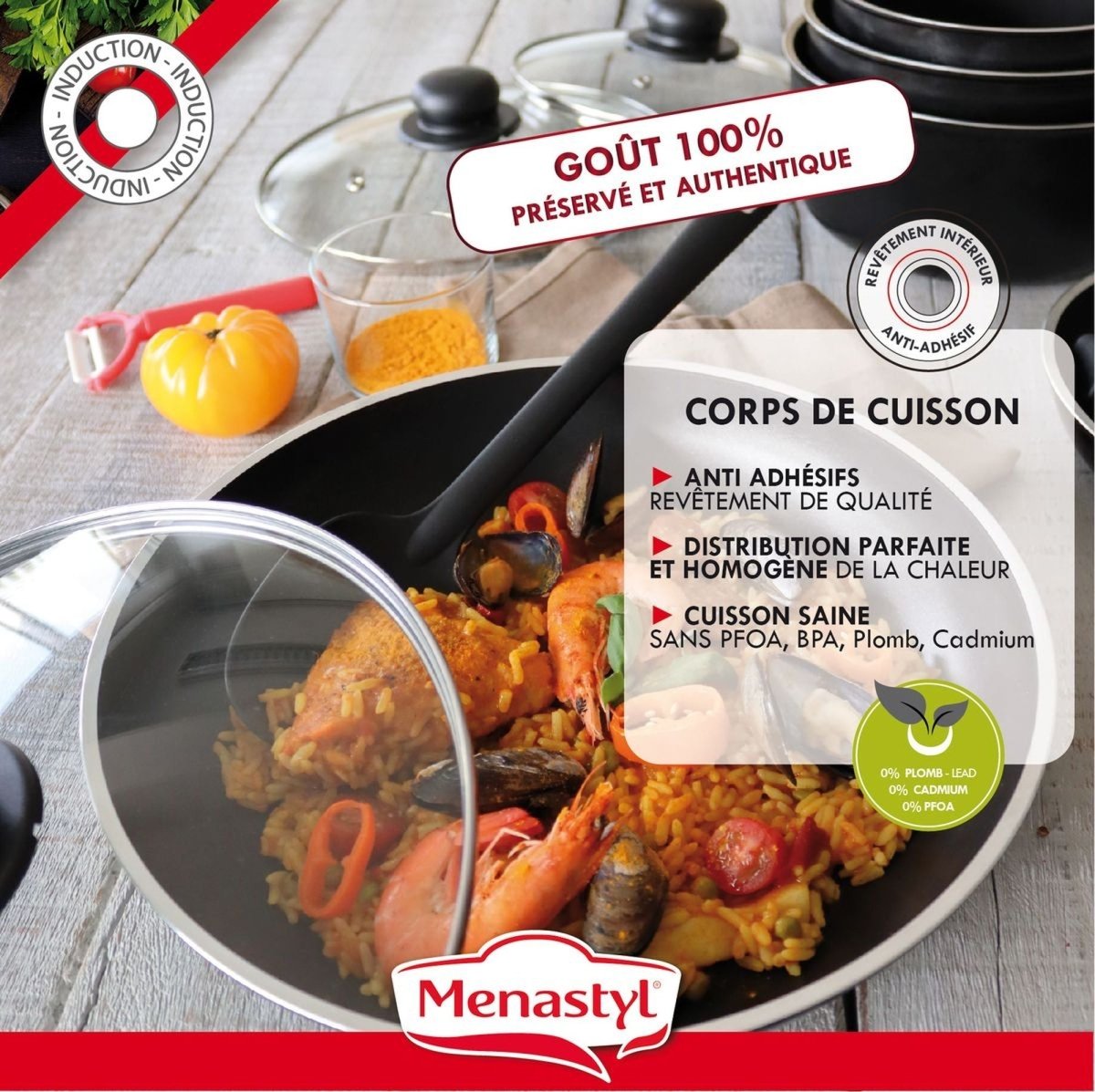 Paella aux fruits de mer cuisinée dans une poêle de la batterie de cuisine Iris en aluminium noir, avec poignée amovible
